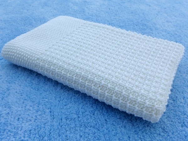 Zeitlose Babydecke aus Merinowolle - Strickanleitung