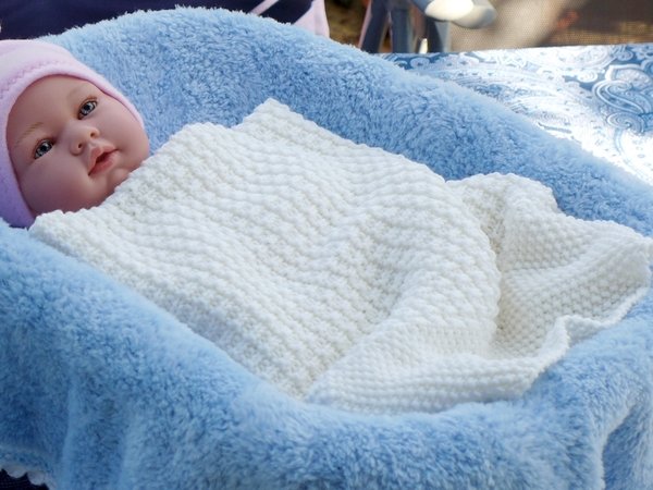 Zeitlose Babydecke aus Merinowolle - Strickanleitung