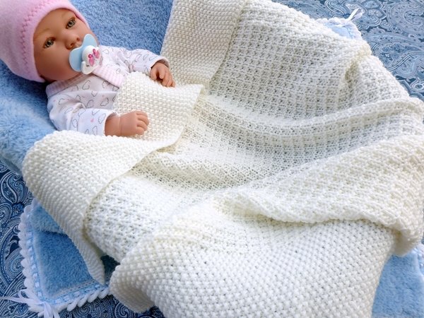 Zeitlose Babydecke aus Merinowolle - Strickanleitung