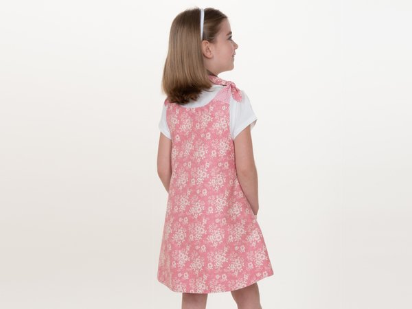 Multi-seasonal girls dress sewing pattern with bow, pocket, reversible